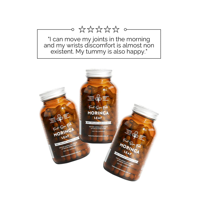 Two bottles of Organic Moringa Capsules showing whole-leaf, freeze-dried quality.